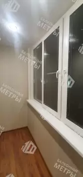 Остекление балкона и балконного блока профилем Rehau 60 и отделка панелями ПВХ